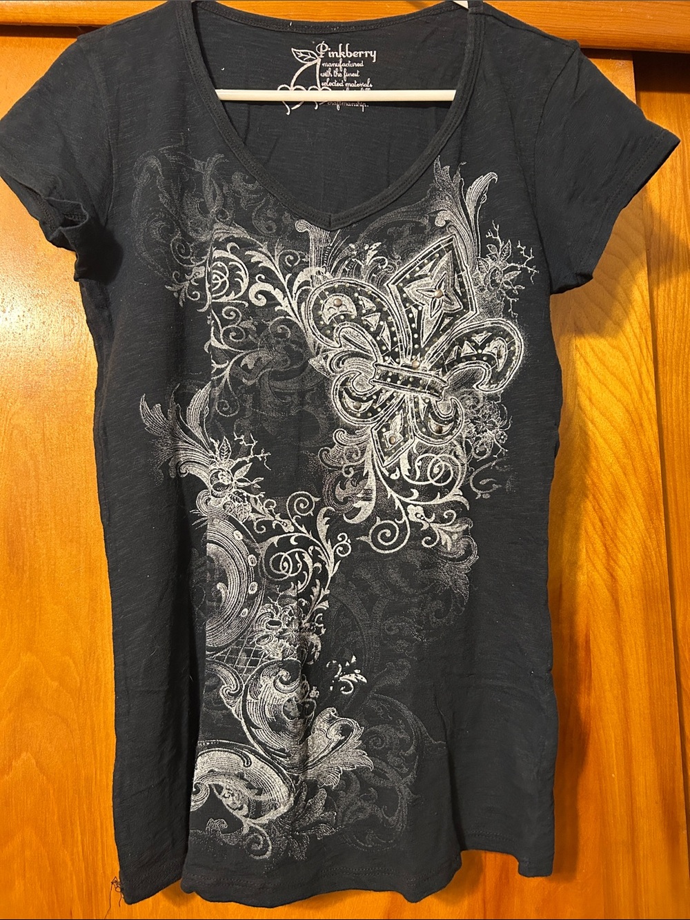 Black V-Neck Short Sleeve Tee with Silver Fleur Graphic